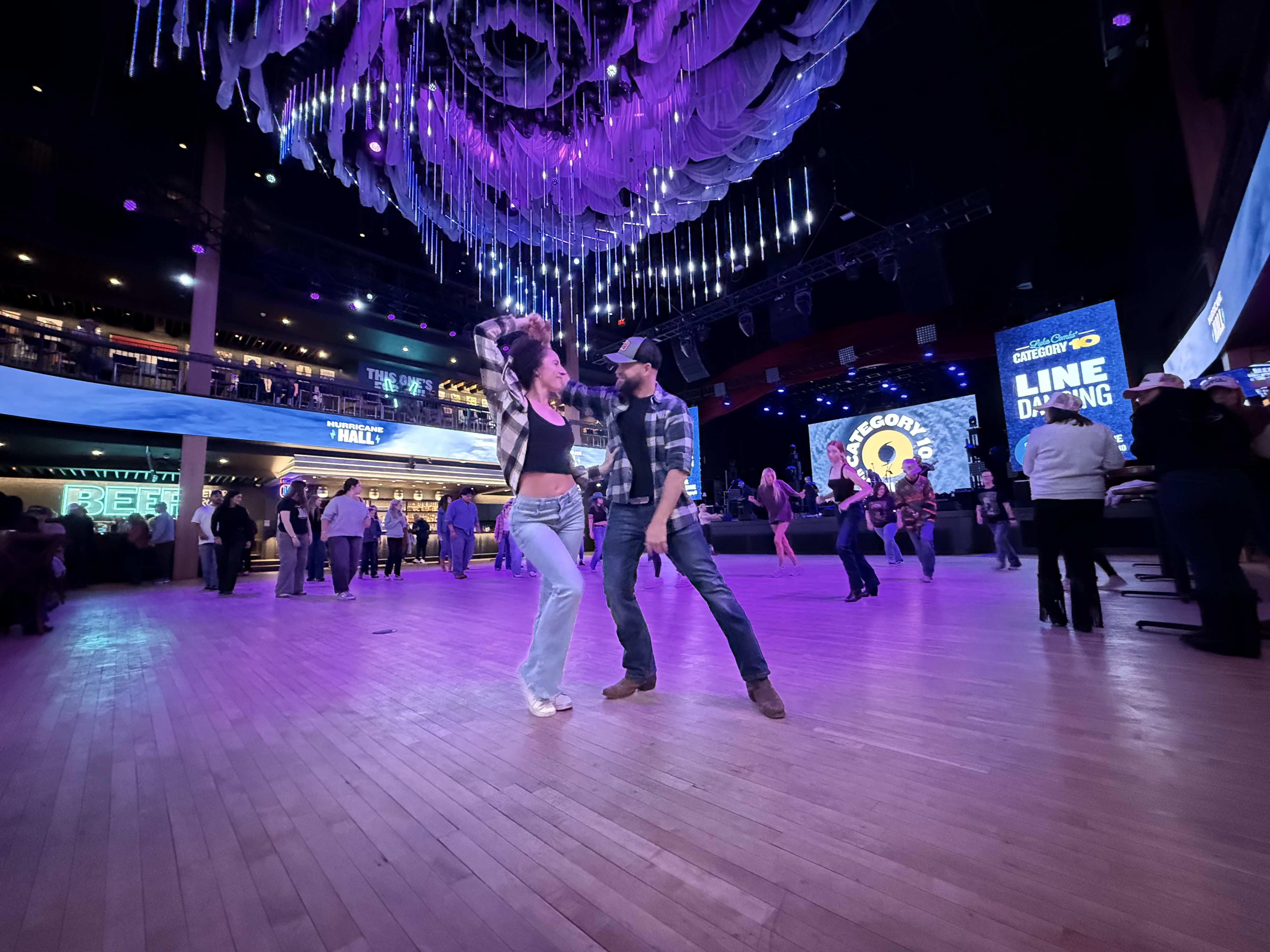 A partner dance moment during the lesson
